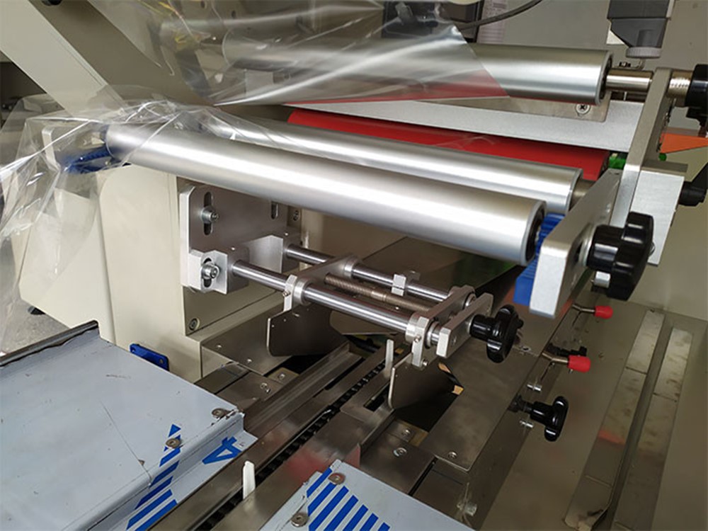 枕式自動午夜视频免费看拉膜機構